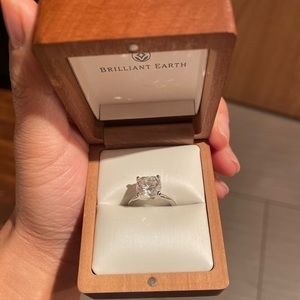 Cushion cut Brilliant Earth Moissanite engagement ring.